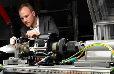 Male engineer working on some machinery 