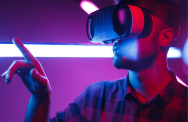 Man with a VR headset on in a purple room