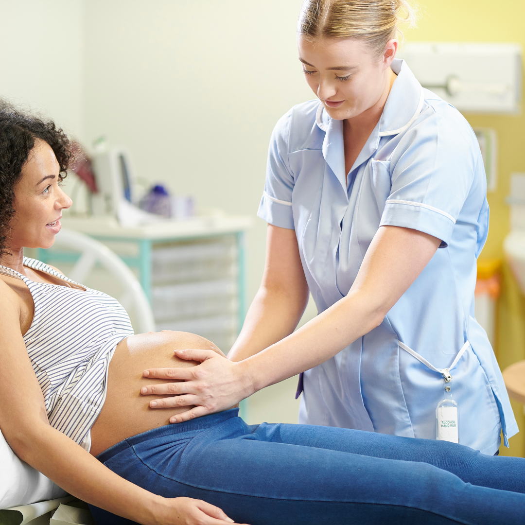 midwife with pregnant woman