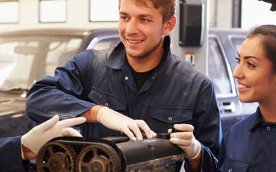 Group of mechanics in overalls