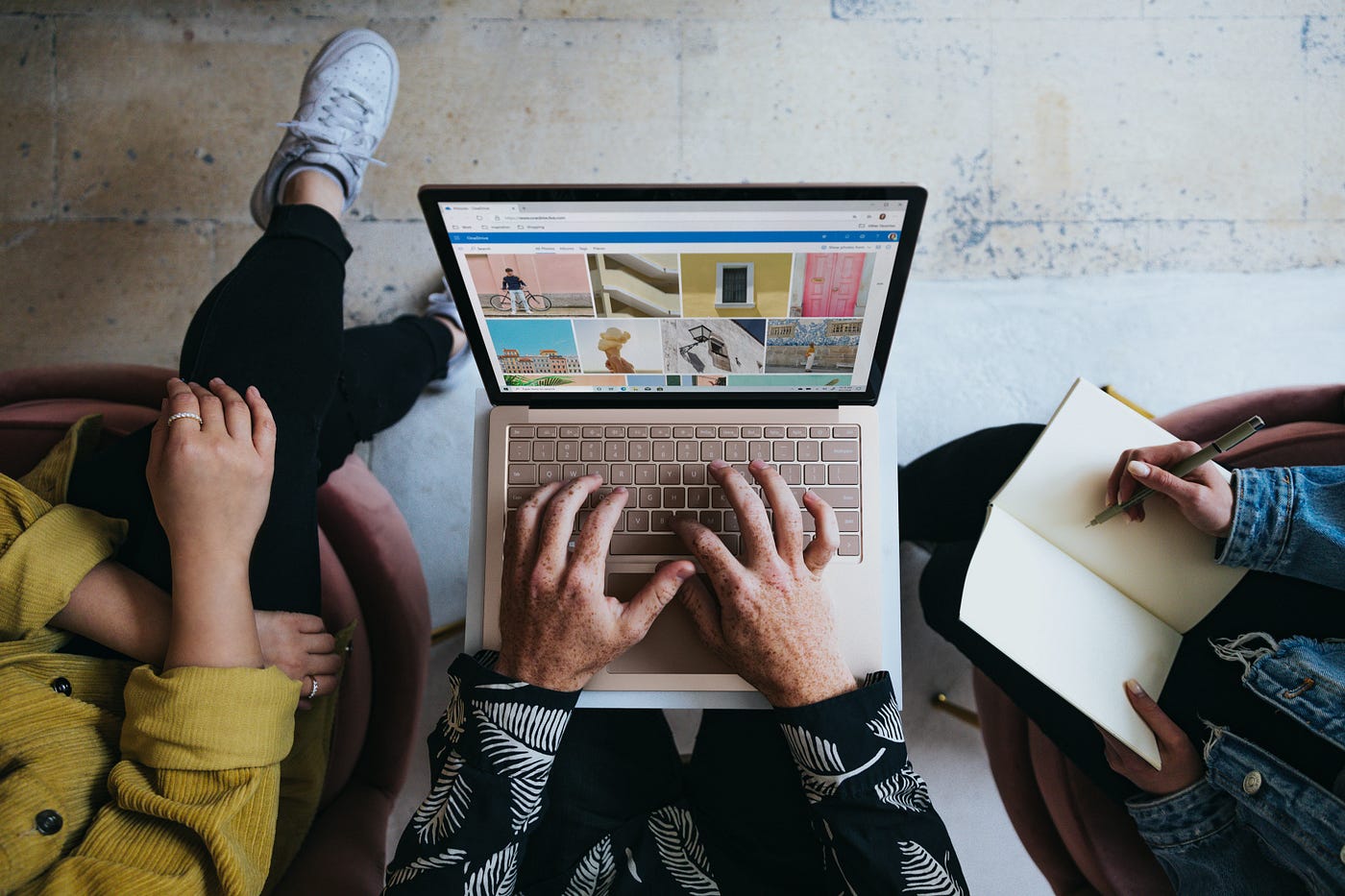 Someone typing on a computer