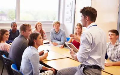 Group of people seated around a table