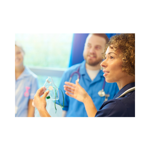 Nurse demonstrating an oxygen mask